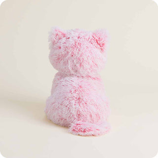 Back view of pink fluffy kitten Warmies stuffed animal plush toy on cream background