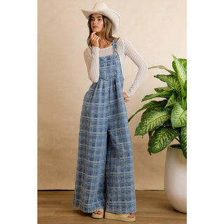 BiBi wide-leg plaid denim overalls in blue with adjustable straps and button closures