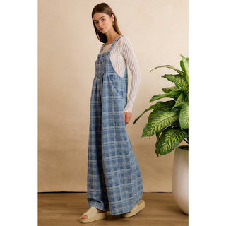 BiBi wide-leg plaid denim overalls in blue, worn over a white ribbed long-sleeve top