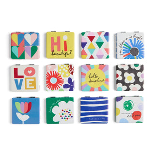 Set of 12 colorful square pocket mirrors with various designs including floral, geometric, and inspirational text patterns