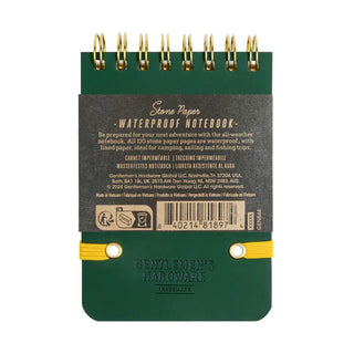 Green pocket waterproof notebook with gold spiral binding and yellow elastic band