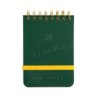 Green waterproof mini notebook with gold twin wire binding and yellow elastic band