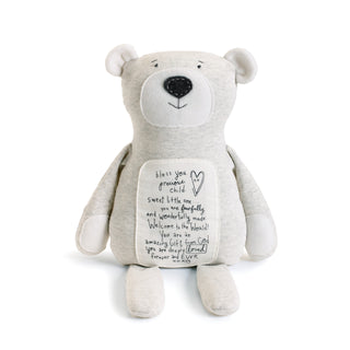 Light gray plush teddy bear with inspirational message patch on belly, seated upright