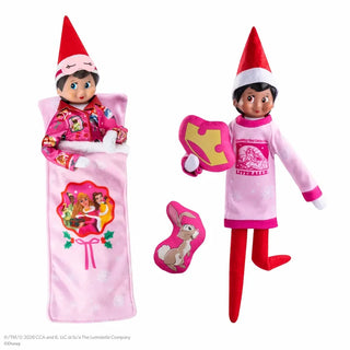 Elf on the Shelf girl dolls with pink Disney Princess pajamas, sleeping bag, and plush pillows