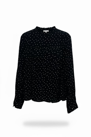 Black long-sleeve blouse with white polka dot print and mock neck collar