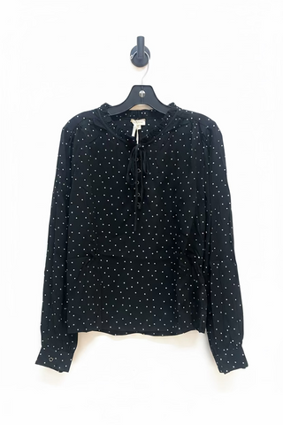 Black long-sleeve polka dot blouse with ruffled neckline and lace-up tie front