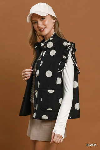 Umgee black quilted vest with large tennis ball print and ruffle trim details