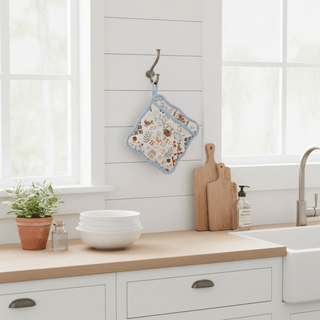 Home Sweet Home potholder hanging on hook in farmhouse kitchen