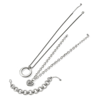 Brighton Pretty Tough Stud Link Bracelet layered with silver chain and heart necklaces for everyday stack