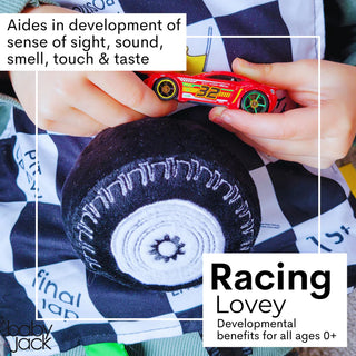 Small hands holding red race car over Racing Flag Lovey plush tire with gear center detail