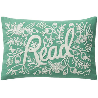 Rifle Paper Co. x Loloi sage green pillow with white embroidered floral design and Read script lettering