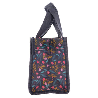Karma recycled tiny gift bag with dark charcoal base and colorful floral pattern featuring pink and teal flowers