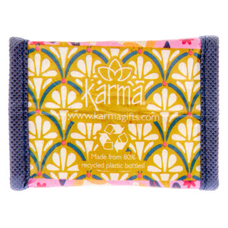 Back of Karma recycled tiny gift bag showing floral pattern and eco-friendly recycled plastic bottle information