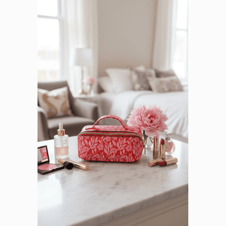 Red Floral Cosmetic Bag on vanity with beauty products