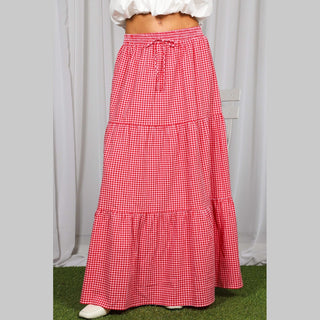 Front view of women's red gingham maxi skirt with two-tiered ruffle design and checkered pattern