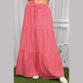 Red and white small-check gingham maxi skirt with three ruffled tiers and floor-length drape