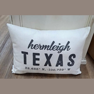 Hermleigh Texas coordinates pillow in off-white linen fabric on light wood floor