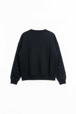 Black crew neck sweatshirt with rhinestud embellishments along the sleeves, back view