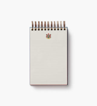 Rifle Paper Co. Rosette spiral notepad open to lined cream pages with floral motif