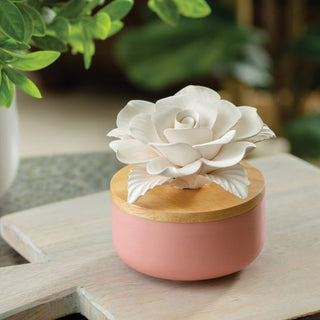 Candle Warmers porcelain rosette aroma diffuser with white flower on pink ceramic base
