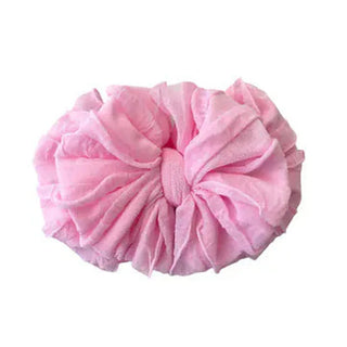 Light pastel pink ruffled baby headband with compact gathered sheer ribbed bow