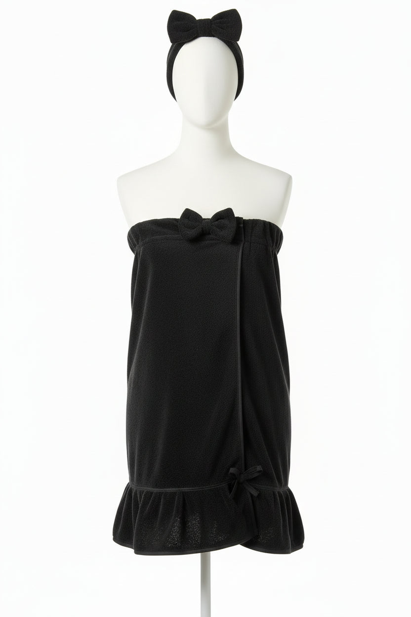 
Spa Wrap & Headband Combo
Say goodbye to towels that slip and slide while you're getting ready. This plush spa wrap features a secure Velcro closure and elastic back that keeps everything perfectly in place, so you can move freely while doing your skincare, makeup, or hair routine. The charming ruffle detail adds a touch of elegance to your self-care moments.