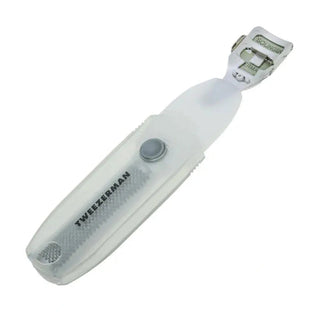 Top-down shot of Tweezerman Solingen Germany callus shaver with open metal clip mechanism