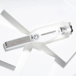 Tweezerman white translucent Safety Slide callus shaver with silver diamond-grit rasp and metal clip