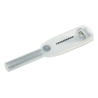 Side view of Tweezerman foot care tool showing ergonomic white handle and adjustable gray dial