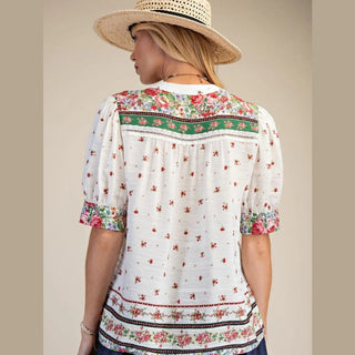 Woman wearing a floral blouse 