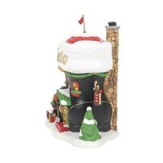 Department 56 Santa's Boot Shop Christmas village building with snow-covered roof and chimney