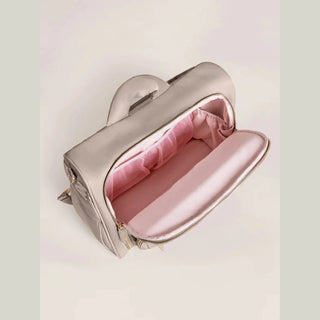 Taupe JuJuBe Satchel interior detail showing pink satin lining, mesh pocket, and structured divider