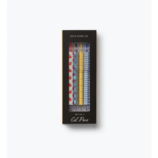 Rifle Paper Co. Schoolhouse Gel Pen Set of 4 in decorative packaging with apple, ruler, and gingham patterns