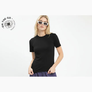 Woman wearing a black t-shirt and sunglasses with 'On-The-Go' logo.