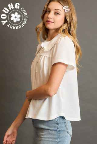 Woman wearing a white blouse