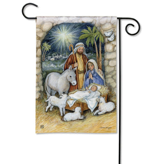 Silent Night nativity scene garden flag showing Mary, Joseph, baby Jesus, donkey, and lambs