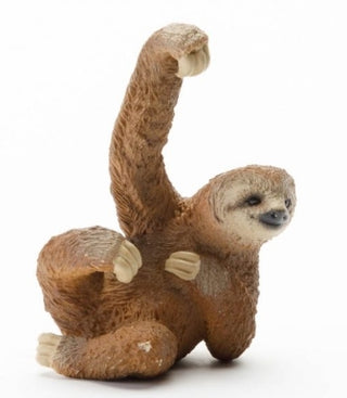 Sloth figurine with one arm raised 
