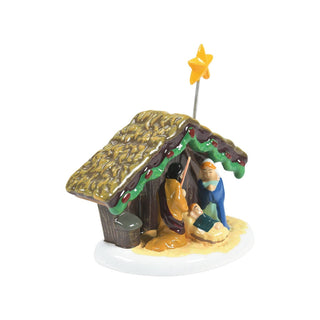 Department 56 Snow Village Nativity scene with stable, figures, and star