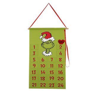 Grinch themed green felt advent calendar with numbered pockets 1 through 24 and naughty heart accent