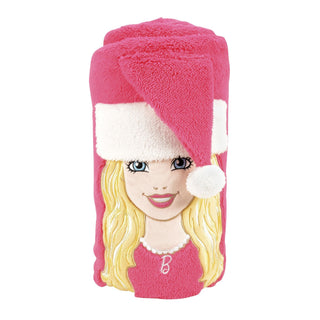 Rolled hot pink Barbie Santa throw blanket with embroidered blonde Barbie face wearing Santa hat
