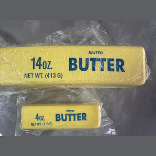 Set of two yellow butter squishies in plastic packaging showing size comparison