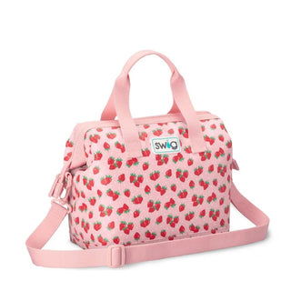 Pink strawberry print Swig cooler bag with adjustable shoulder strap and front logo patch