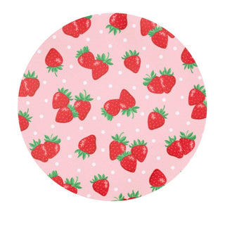 Close-up of woven polyester fabric featuring red strawberries, green leaves, and white polka dots on pink background