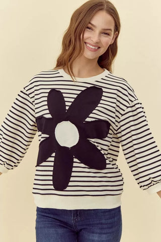 Jodifl cream and black striped knit top with large daisy flower patch