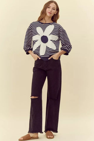 Navy striped pullover top with large white daisy flower patch, three-quarter sleeves