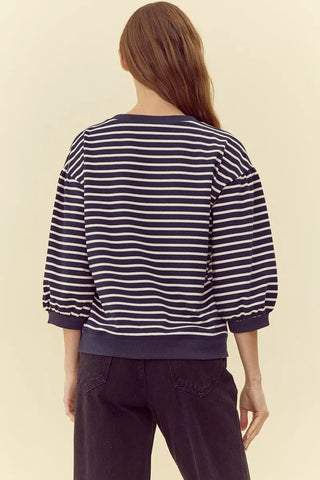Navy and white striped puff sleeve sweatshirt top, back view