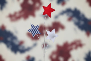 Decorative garden stake with red, white, and blue stars