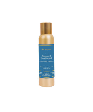 Aromatique Sunkissed Sandalwood fragranced room spray in gold aerosol can with teal label
