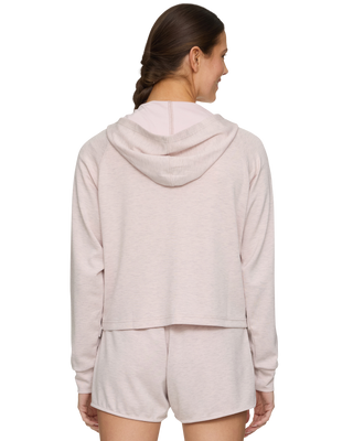 Back view of woman wearing Flag and Anthem Super Soft Full Zip Hoodie in pink heather with matching shorts