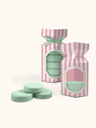 Studio Oh Sweetheart Pink Shower Steamers in pink striped packaging with mint green discs displayed